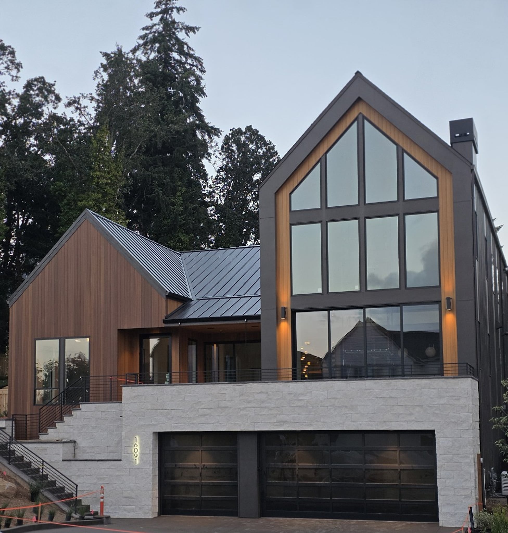 Custom modern luxury home exterior lighting and electrical build in Oregon